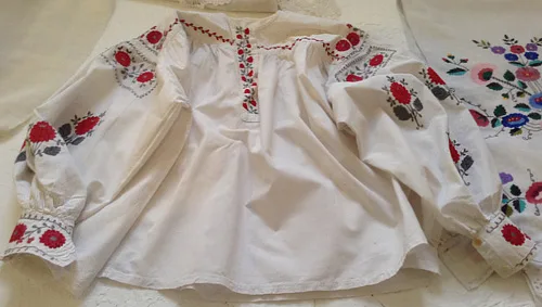 Young girl’s embroidered shirt with floral patterns