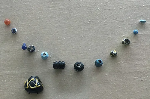 Charming beads from the Age of Antiquity, the territory of modern Southern Ukraine, the 4th century B.C. – 4th century A.D.