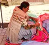Bolivian folk dress. Cholita costume is in vogue today