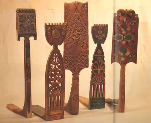 Complicated distaff constructions adorned with beautiful carving
