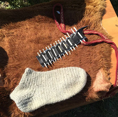 Replicas of bone knitting needles used to knit socks, mitts, and other accessories in the Middle Ages