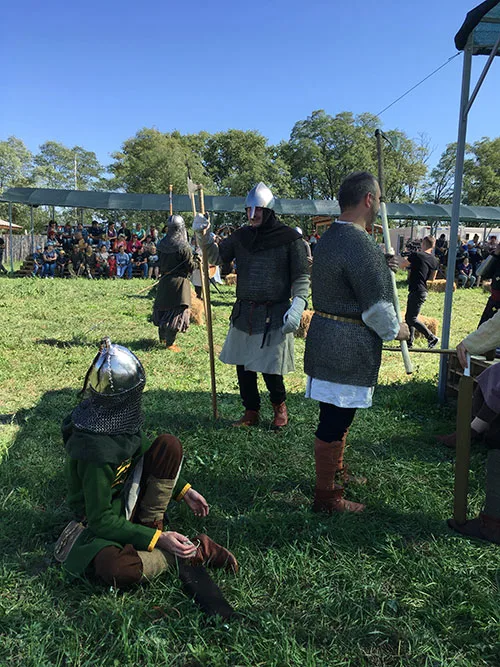 Medieval warriors in mail and helmets
