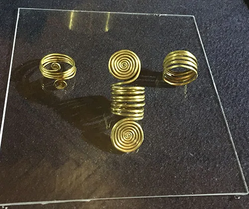 Ancient gold, silver, and bronze jewelry from the grave. The oldest pieces are dated around the 14th-10th century B.C.