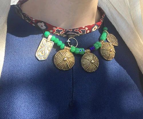 Modern replica of authentic necklace and small fibula