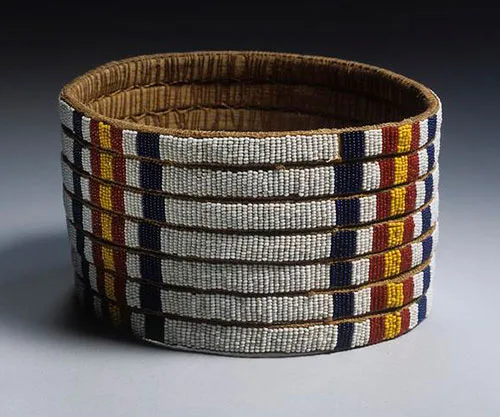 Kenyan traditional accessories – beaded headdresses and shoes made from rubber, leather, and wood