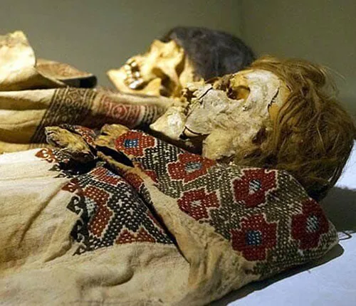 Lebanese 13th-century mummies in cross-stitch embroidered tunics