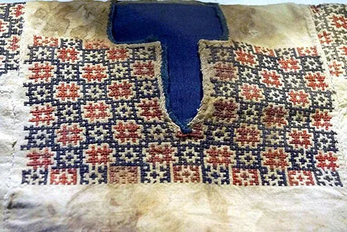 Lebanese 13th-century mummies in cross-stitch embroidered tunics