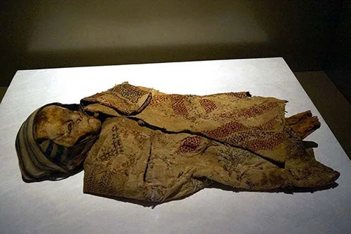 Lebanese 13th-century mummies in cross-stitch embroidered tunics