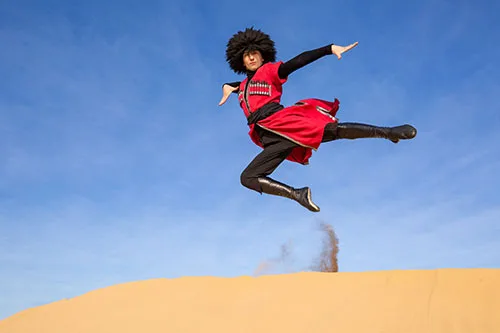 Outstanding Georgian folk dancer during a jump
