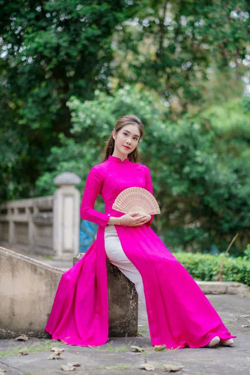 Modern Vietnamese Ao Dai attire is blindingly feminine