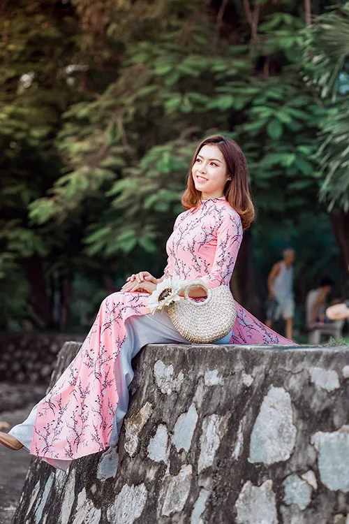 Modern Vietnamese Ao Dai attire is blindingly feminine