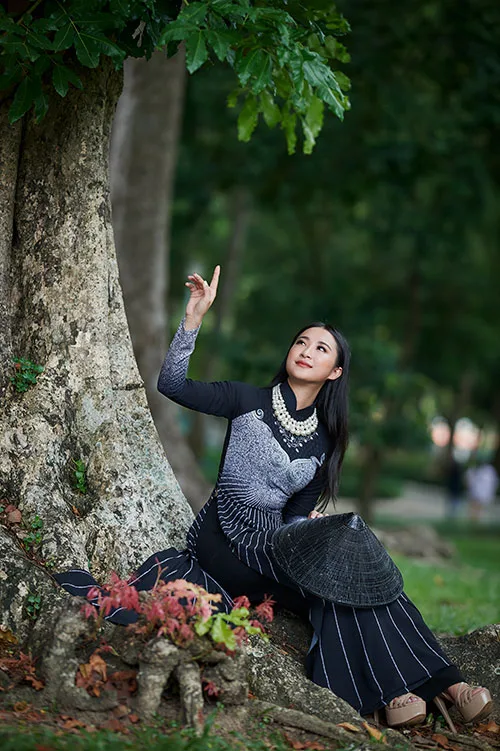 Modern Vietnamese Ao Dai attire is blindingly feminine