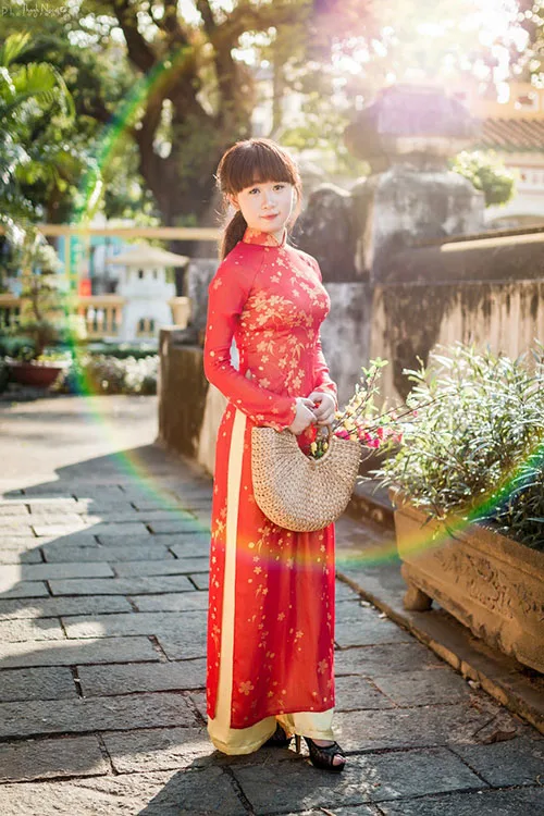 Modern Vietnamese Ao Dai attire is blindingly feminine